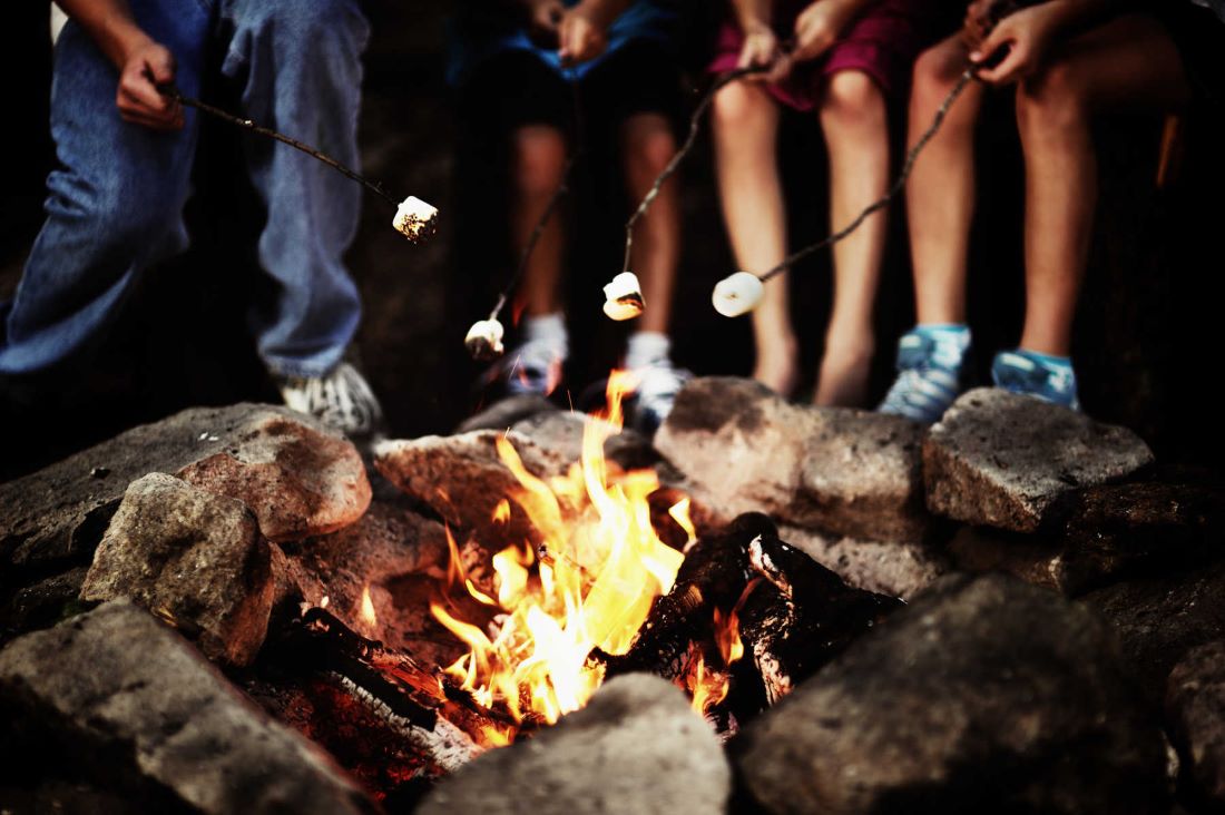 Marshmallows roasting on a fire